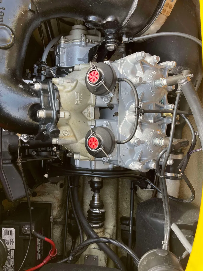 Slide: The Image of 2002 Sea-Doo RX engine compartment with visible components and wiring. - 11