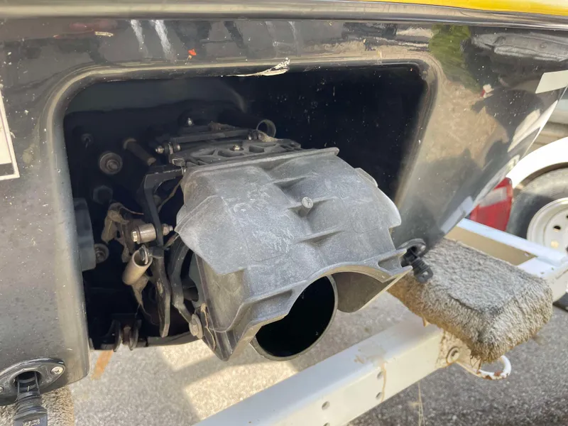 Slide: The Image of Close-up of a 2002 Sea-Doo RX jet ski engine component on a trailer. - 14