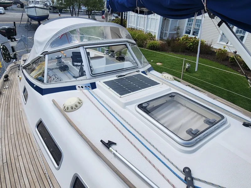 Slide: The Image of Hallberg-Rassy 342 sailboat, 2016 model, featuring deck and cockpit with solar panel. - 13