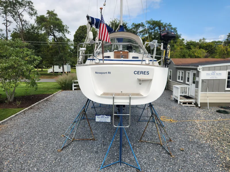 Slide: The Image of 2016 Hallberg-Rassy 342 sailboat "Ceres" on stands, Newport RI, gravel lot. - 5