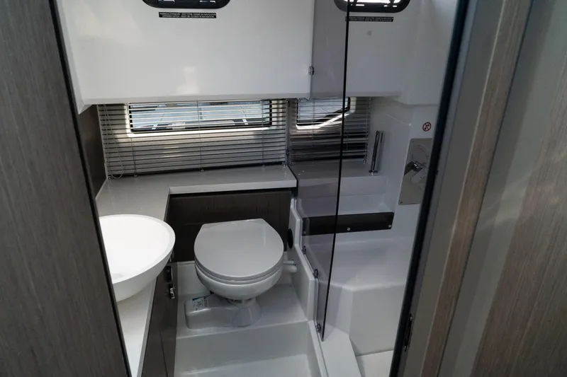 Slide: The Image of 2025 Wellcraft 355 yacht bathroom with modern fixtures and sleek design. - 27
