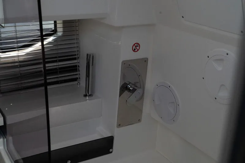 Slide: The Image of Interior view of 2025 Wellcraft 355 boat, featuring sleek design and modern fixtures. - 28