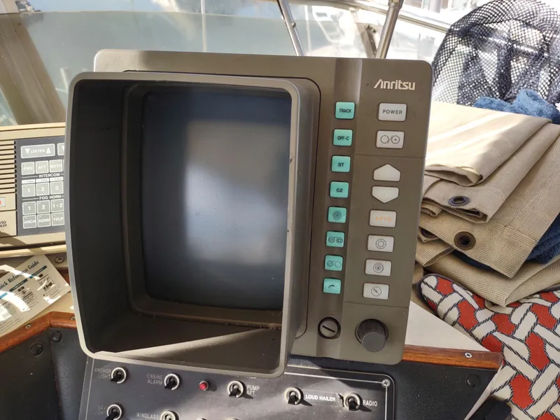 Slide: The Image of Control panel of a 1988 Marinette Marquis Motor Yacht with Anritsu display. - 9