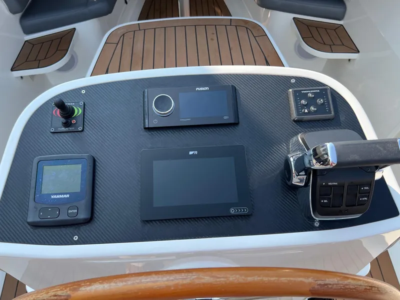 Slide: The Image of Control panel of 2022 AdmiralsTender C28 boat with navigation and audio systems. - 10