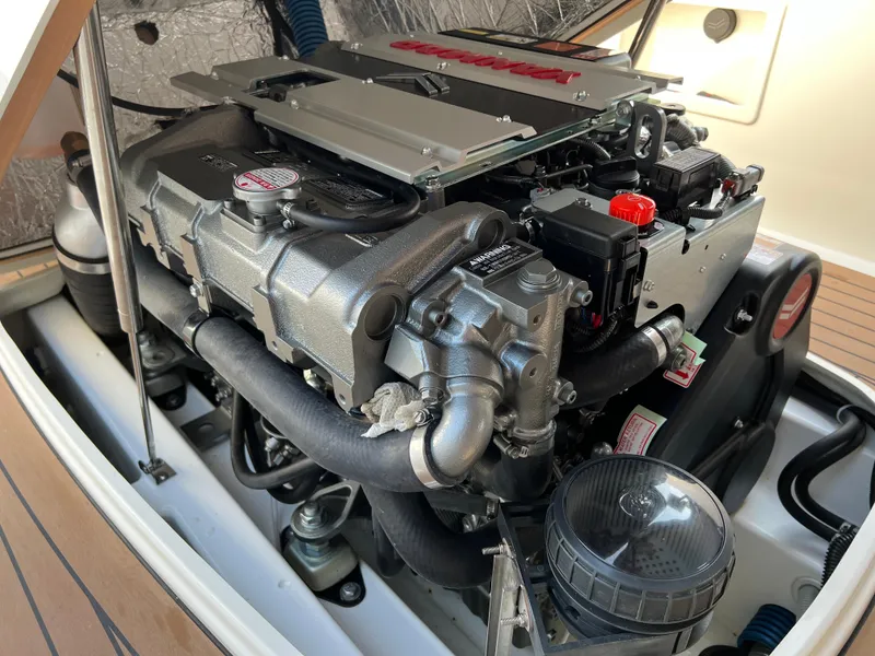 Slide: The Image of Engine of 2022 AdmiralsTender C28 boat, showcasing detailed mechanical components. - 4