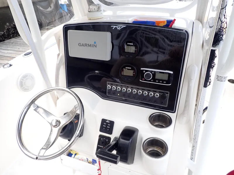 Slide: The Image of 2016 Tidewater 230 CC Adventure boat console with Garmin navigation system. - 10