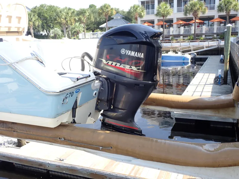Slide: The Image of Tidewater 230 CC Adventure 2016 with Yamaha outboard motor at dock. - 29