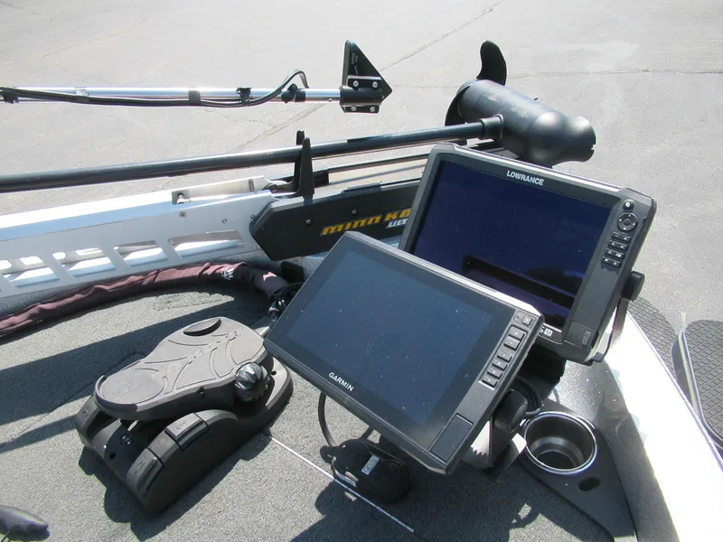 Slide: The Image of 2017 Ranger 212LS Reata boat dashboard with Garmin and Lowrance navigation systems. - 2