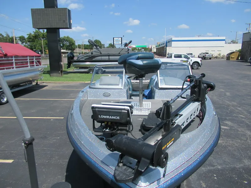 Slide: The Image of 2017 Ranger 212LS Reata boat with Lowrance equipment in a parking lot. - 6