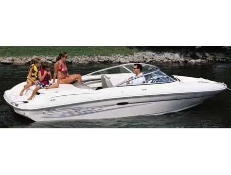 Slide: The Image of 2004 Sea Ray 200 Sport boat with passengers on a calm waterway. - 19