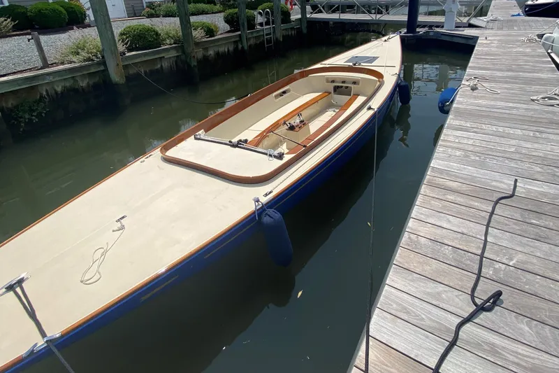 Slide: The Image of 2023 C.W. Hood 32 Daysailer docked at a marina, showcasing sleek design and craftsmanship. - 3