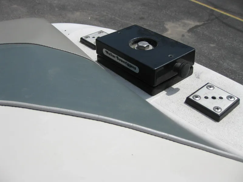 Slide: The Image of Close-up of a 2000 Four Winns 235 Sundowner I/O boat component. - 12