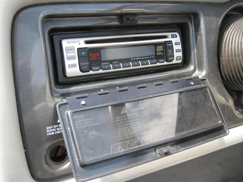 Slide: The Image of Sony stereo system in 2000 Four Winns 235 Sundowner I/O boat dashboard. - 15