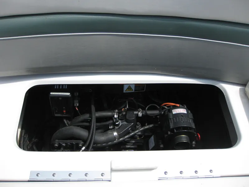 Slide: The Image of Engine compartment of 2000 Four Winns 235 Sundowner I/O boat. - 16