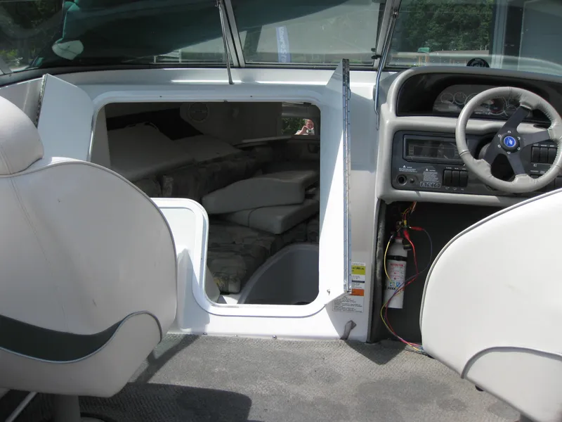 Slide: The Image of Interior view of 2000 Four Winns 235 Sundowner I/O boat cabin and cockpit. - 5