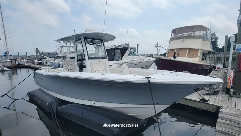 The Image of 2020 Sea Hunt Gamefish 27 Forward Seating boat docked at marina. - 0