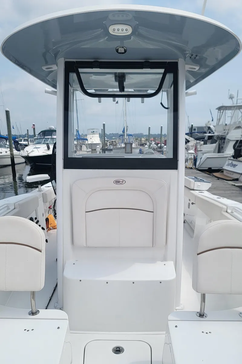 Slide: The Image of 2020 Sea Hunt Gamefish 27 Forward Seating boat docked at marina. - 10