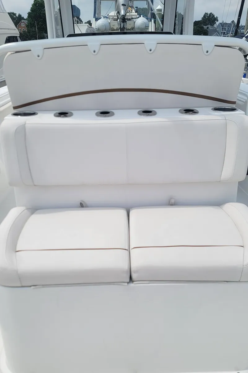 Slide: The Image of 2020 Sea Hunt Gamefish 27 Forward Seating, white cushioned boat seats. - 19