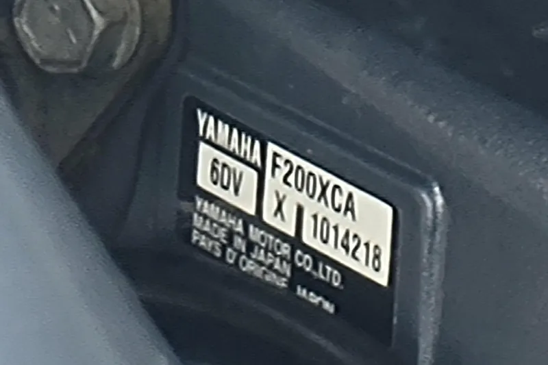 Slide: The Image of Yamaha F200XCA engine label on 2020 Sea Hunt Gamefish 27 Forward Seating boat. - 23