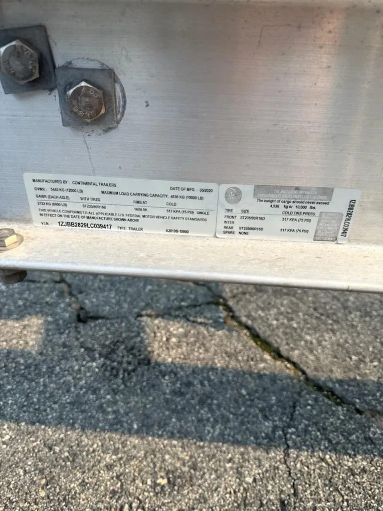 Slide: The Image of Close-up of a Sea Hunt Gamefish 27 label on a metal surface, 2020 model. - 30