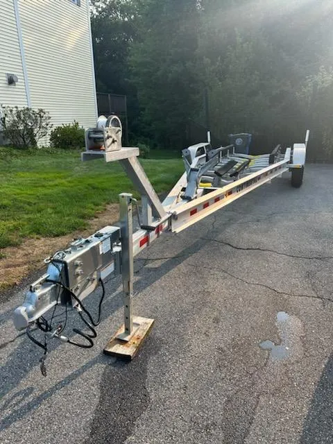 Slide: The Image of 2020 Sea Hunt Gamefish 27 trailer parked on driveway, ready for transport. - 31
