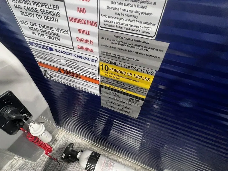 Slide: The Image of 2023 Bennington 22 SSR capacity label, showing maximum of 10 persons or 1392 lbs. - 15