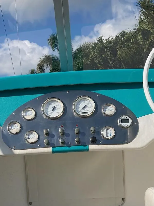Slide: The Image of Dashboard of a 2013 Cherubini 20 VS boat with gauges and controls. - 10