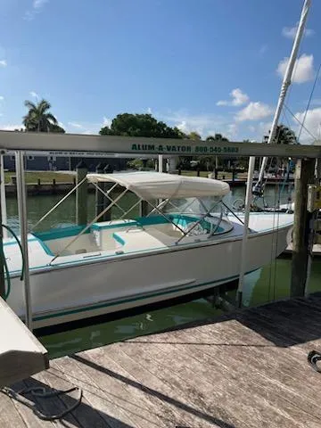 Slide: The Image of 2013 Cherubini 20 VS boat docked in sunny marina. - 12