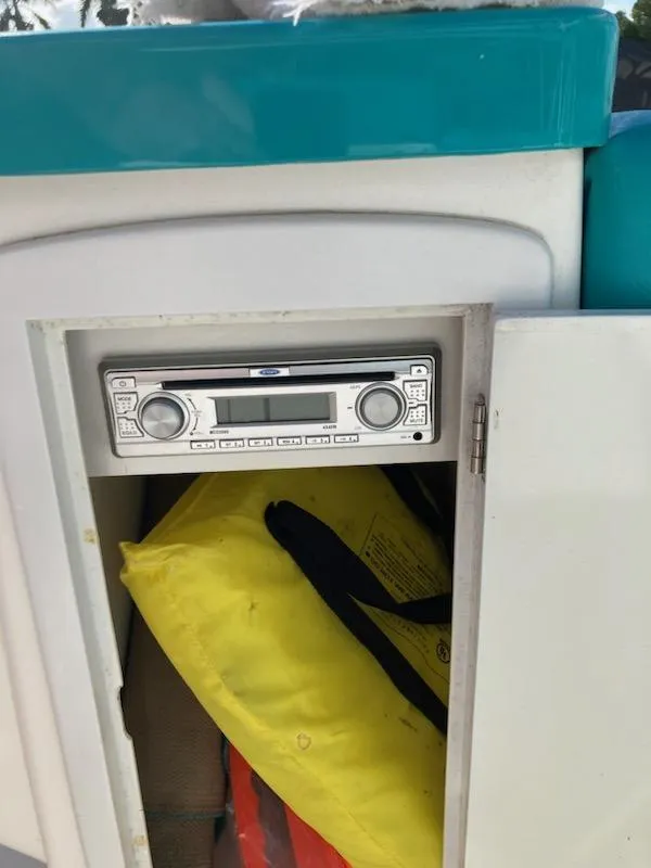 Slide: The Image of Cherubini 20 VS 2013 stereo system in a cabinet with life jackets. - 16