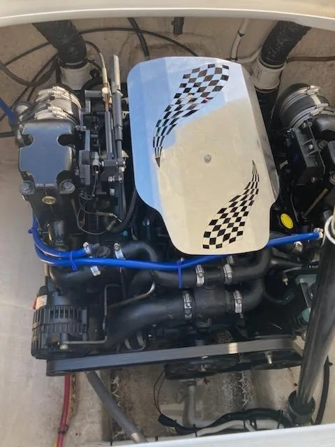 Slide: The Image of 2013 Cherubini 20 VS engine with checkered flag design on cover. - 3