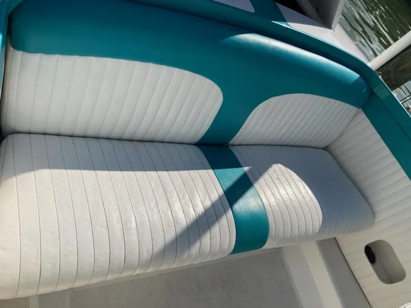 Slide: The Image of Teal and white seating on 2013 Cherubini 20 VS boat. - 5