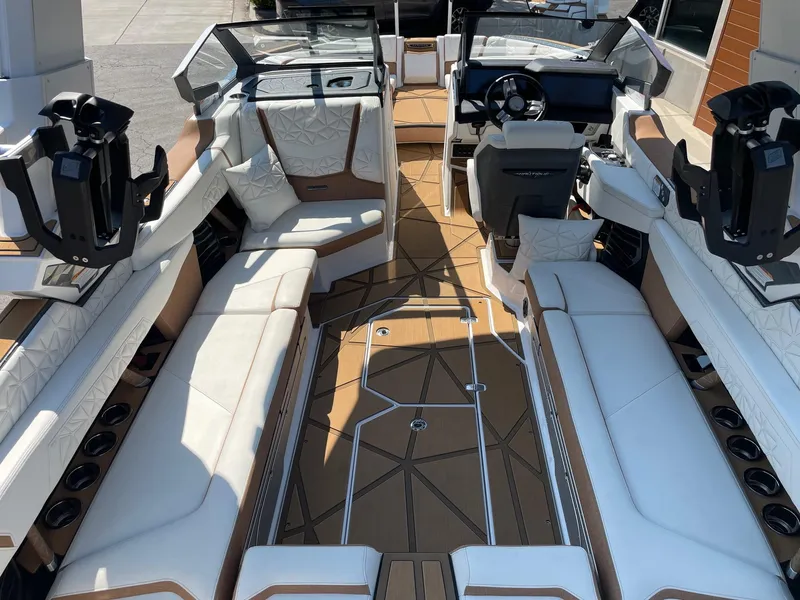 Slide: The Image of 2024 Nautique Super Air Nautique G25 Paragon interior with luxurious seating and modern design. - 4