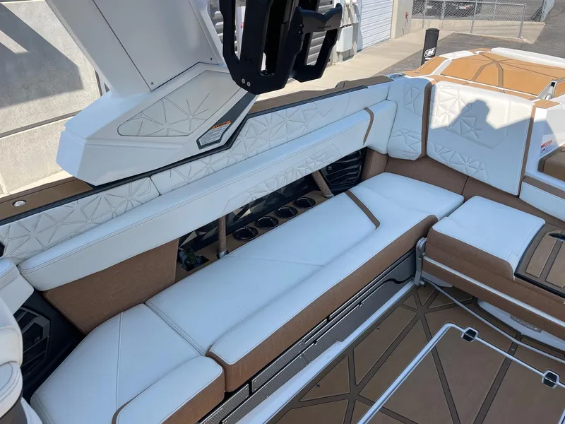 Slide: The Image of 2024 Nautique Super Air Nautique G25 Paragon interior with luxurious seating and modern design. - 6