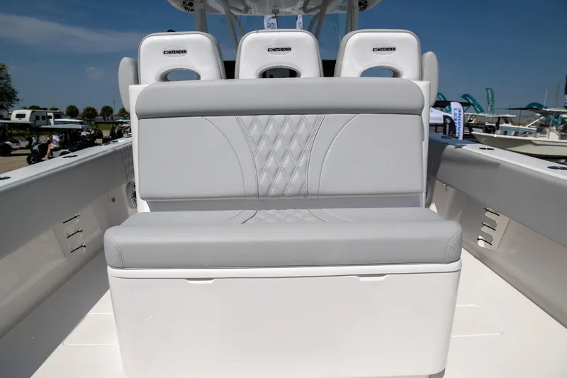 Slide: The Image of 2024 Contender 39 ST boat with sleek gray seating and modern design. - 14