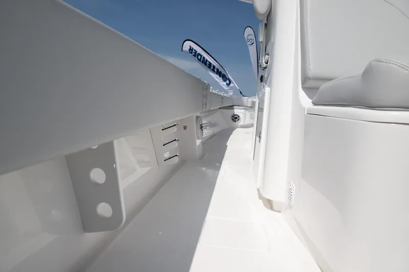 Slide: The Image of 2024 Contender 39 ST boat interior with sleek white design and modern features. - 17