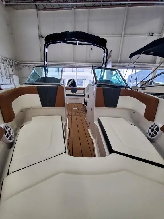 Slide: The Image of 2024 Chaparral 23 SSi OB boat interior with spacious seating and modern design. - 7