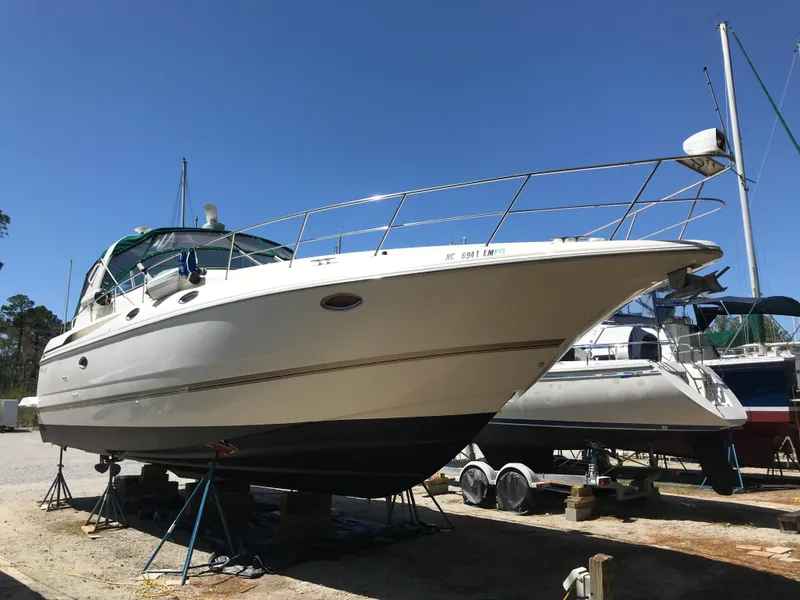 Slide: The Image of 1998 Cruisers Yachts 3870 Esprit on dry dock, side view. - 36