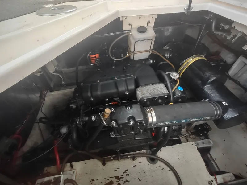 Slide: The Image of Engine compartment of 1998 Cruisers Yachts 3870 Esprit, showcasing mechanical components. - 43