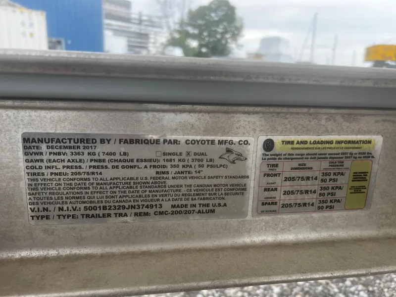 Slide: The Image of Label on a 2018 Robalo R200 Center Console trailer by Coyote MFG Co. - 17