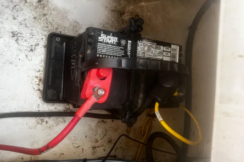 Slide: The Image of Battery compartment of 2018 Robalo R200 Center Console boat with wiring connections. - 20