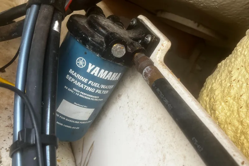 Slide: The Image of Yamaha marine fuel water separating filter on 2018 Robalo R200 Center Console boat. - 22