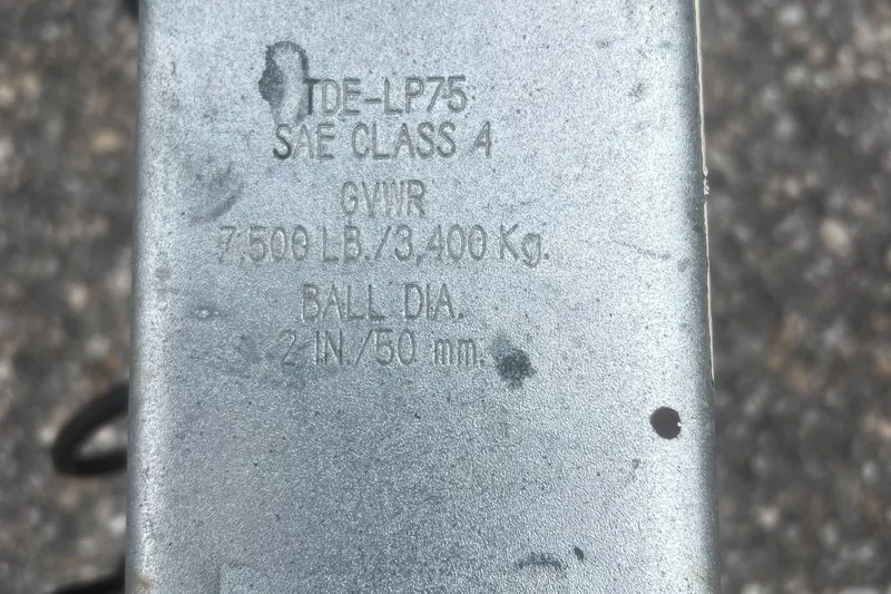 Slide: The Image of Trailer hitch label showing specifications: Class 4, 7500 lbs GVWR, 2-inch ball diameter. - 27