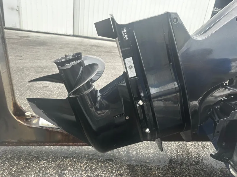 Slide: The Image of 2017 Bayliner Element F18 outboard motor propeller close-up. - 14