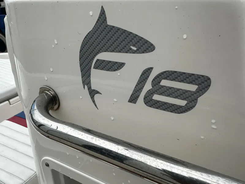 Slide: The Image of Bayliner Element F18 logo on boat, 2017 model, with shark design. - 28