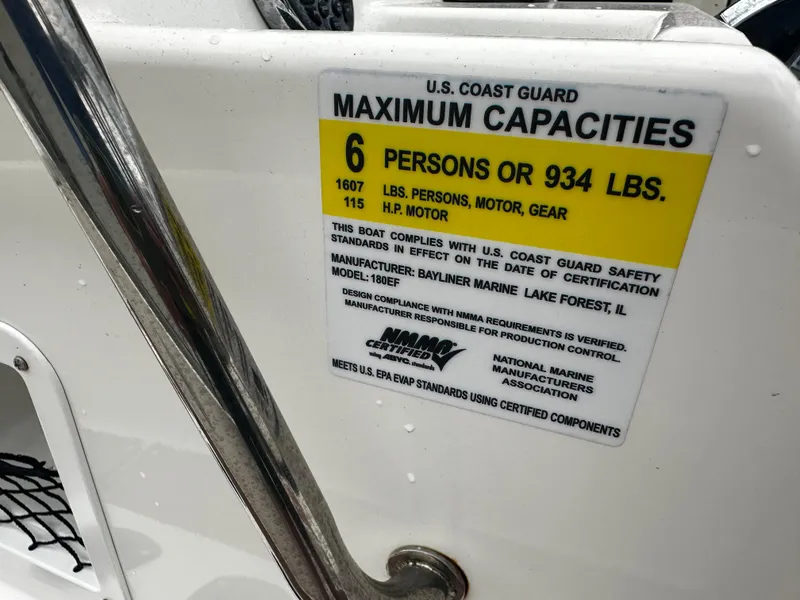 Slide: The Image of Capacity label on 2017 Bayliner Element F18, max 6 people or 934 lbs. - 29