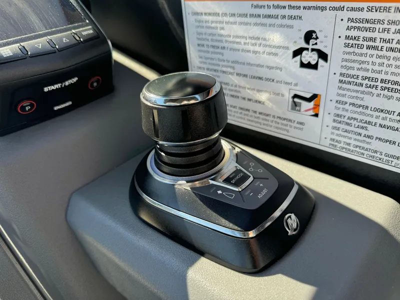 Slide: The Image of Joystick control of 2025 Manitou Explore 24 Switchback Dual SHP with Trifold Bench. - 21