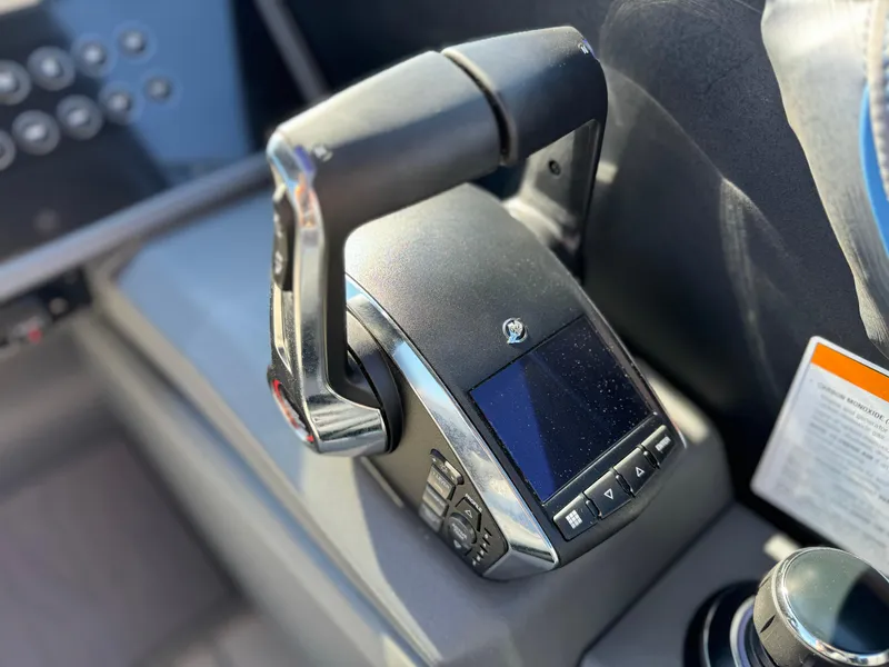 Slide: The Image of Close-up of 2025 Manitou Explore 24 Switchback Dual SHP throttle control. - 22