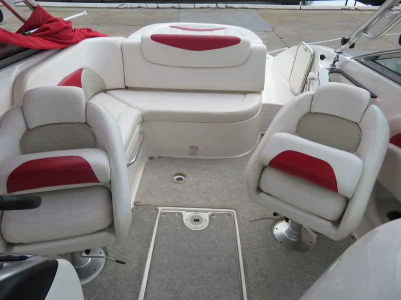 Slide: The Image of 2008 Chaparral SSX 236 boat interior with white and red seating. - 14