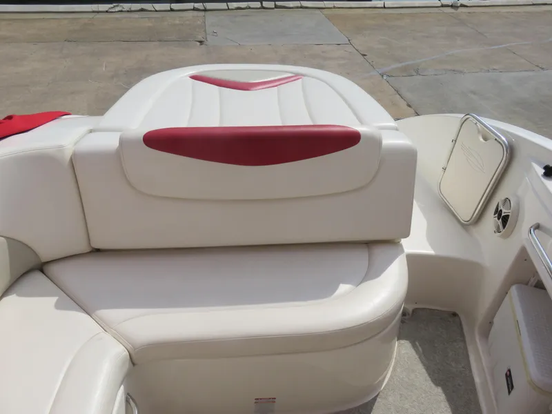 Slide: The Image of 2008 Chaparral SSX 236 boat interior with white and red seating. - 5