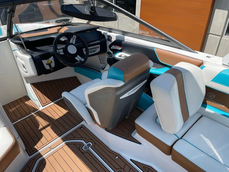 Slide: The Image of 2017 Nautique Super Air G23 interior with modern dashboard and stylish seating. - 6